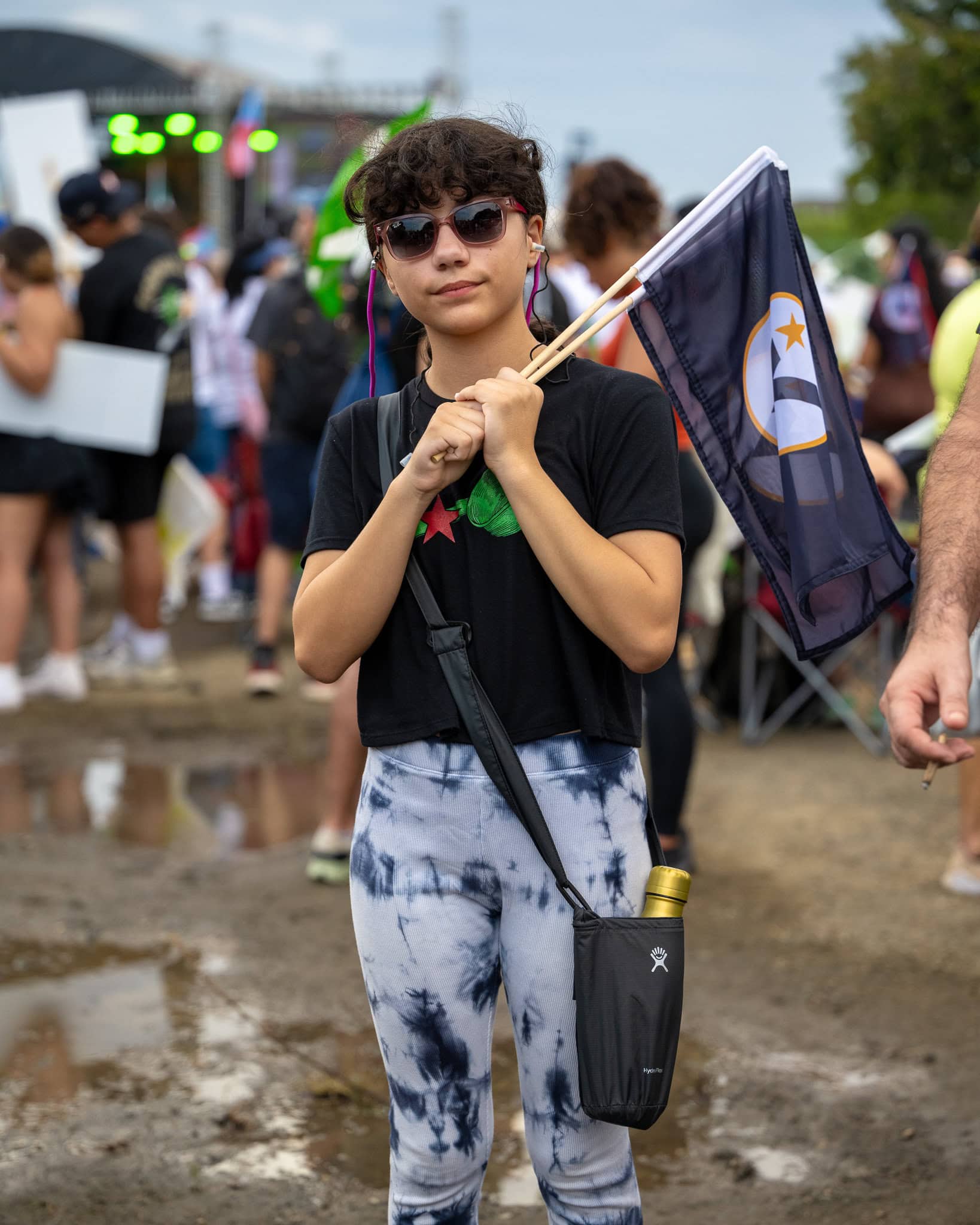 Daniela holding a flag at the Festival de La Esperanza in November.