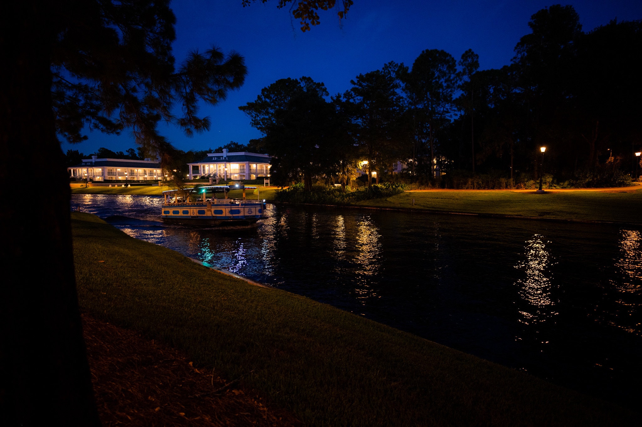 Boats at Port Orleans Riverside at Disney World at night.