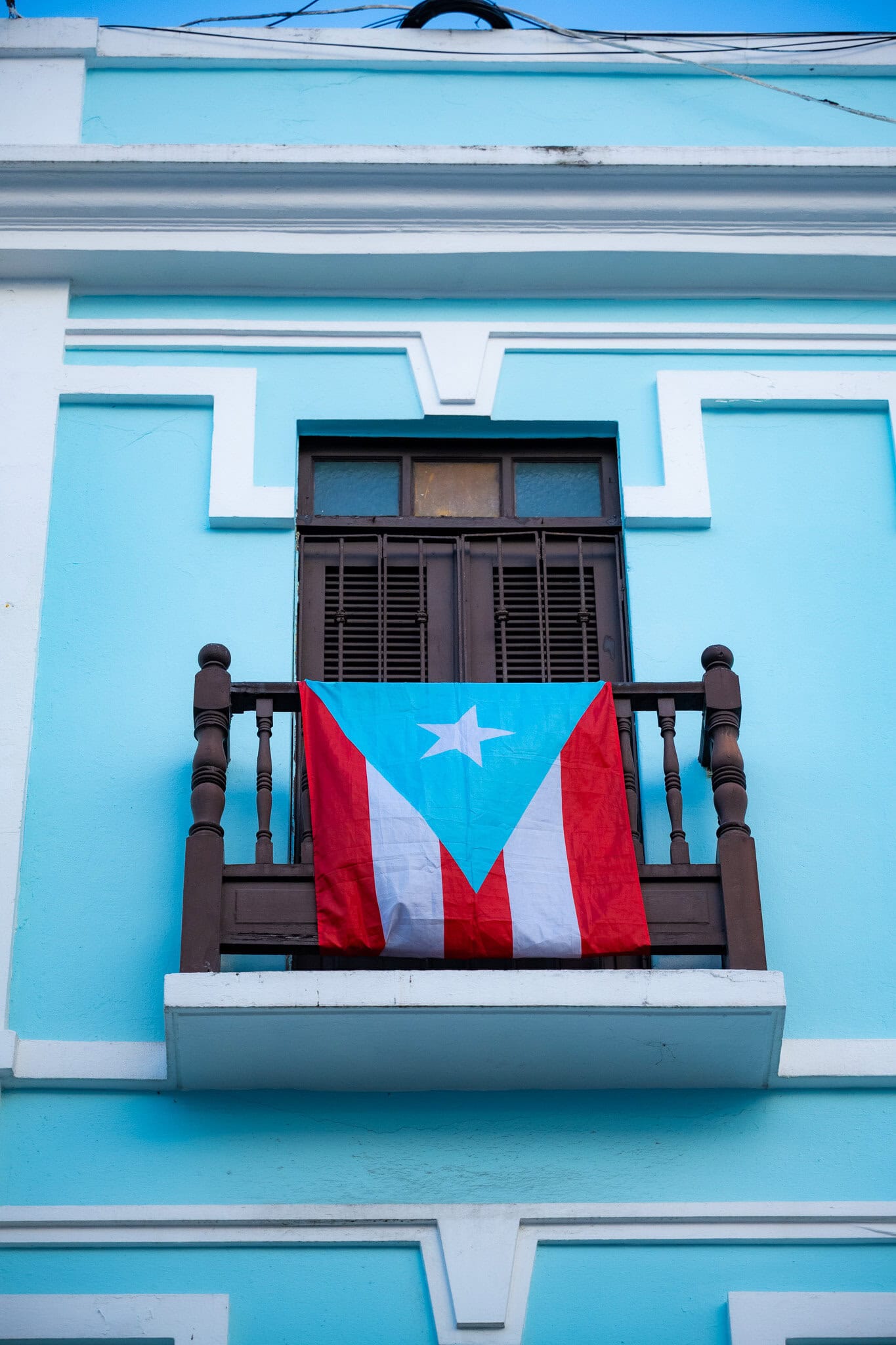 puerto-rican-flag-balcony-san-sebastian-old-san-juan.jpg