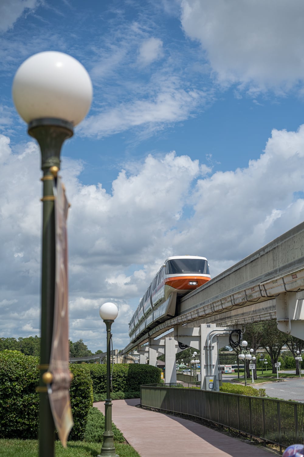 Contemporary walkway and Monorail heading to Magic Kingdom